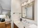 Bathroom features a vanity with quartz countertop at 6412 Wheeler Dr, Charlotte, NC 28211