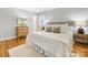 Main bedroom with hardwood floors and neutral color scheme at 6412 Wheeler Dr, Charlotte, NC 28211