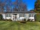 Charming ranch home with well-manicured lawn and landscaping at 6412 Wheeler Dr, Charlotte, NC 28211