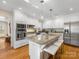 Modern kitchen with stainless steel appliances and island at 6412 Wheeler Dr, Charlotte, NC 28211