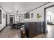 Dining area with a kitchen island and modern pendant lighting at 6475 Highway 73 E Hwy, Mount Pleasant, NC 28124