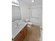 Bathroom with single vanity, tub, and shower at 744 Bartram Ave, Concord, NC 28025