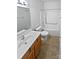 Bathroom with single vanity, tub, and shower at 744 Bartram Ave, Concord, NC 28025