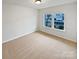 Empty bedroom with carpet and large window at 744 Bartram Ave, Concord, NC 28025