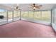 Screened porch with ceiling fans and access to yard at 744 Bartram Ave, Concord, NC 28025