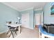 Bright home office features a white desk, built-in closet, and plenty of natural light at 8023 Alford Rd, Fort Mill, SC 29707