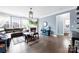 Living room with sectional sofa, fireplace, and hardwood floors at 8023 Alford Rd, Fort Mill, SC 29707