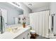 Bathroom with shower/tub, vanity, and mirror at 8049 Charter Oak Ln, Charlotte, NC 28226