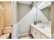 Clean bathroom with vanity, mirror, and shower at 8049 Charter Oak Ln, Charlotte, NC 28226