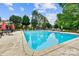 Community pool with plenty of seating at 8049 Charter Oak Ln, Charlotte, NC 28226