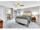 Bedroom with queen bed, built-in shelving, and en-suite bathroom at 9 Pine Tree Rd, Salisbury, NC 28144