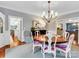 Formal dining room with hardwood floors, an oval table and a chandelier at 9 Pine Tree Rd, Salisbury, NC 28144