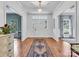 Elegant entryway with hardwood floors and a classic white door at 9 Pine Tree Rd, Salisbury, NC 28144