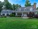 Beautiful two-story home with a spacious lawn and mature trees at 9 Pine Tree Rd, Salisbury, NC 28144