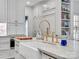 Modern kitchen featuring a farmhouse sink and gold fixtures at 9 Pine Tree Rd, Salisbury, NC 28144