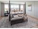 Serene main bedroom with a comfortable bed and sitting bench at Lot 113 Mayes Meadow Dr # Covington, Cornelius, NC 28078