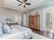 Spacious main bedroom features tray ceiling, hardwood floors, and ample closet space at 11138 Skytop Dr, Huntersville, NC 28078