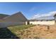 Private backyard with fire pit and storage shed at 152 Suggs Mill Dr, Mooresville, NC 28115