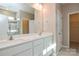 Elegant bathroom with double vanity and a large mirror at 152 Suggs Mill Dr, Mooresville, NC 28115