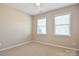 Bedroom with two windows and ceiling fan at 152 Suggs Mill Dr, Mooresville, NC 28115