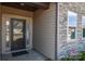 Inviting front entry with a stylish door and stonework detail at 152 Suggs Mill Dr, Mooresville, NC 28115