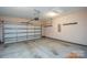 Spacious garage with opener and storage racks at 152 Suggs Mill Dr, Mooresville, NC 28115