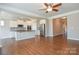 Modern kitchen with white cabinets, stainless steel appliances, and an island at 152 Suggs Mill Dr, Mooresville, NC 28115