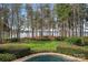 Expansive backyard with direct water access and a small pool at 155 Union Chapel Dr, Mooresville, NC 28117