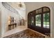 Two-story entry with grand staircase and chandelier at 155 Union Chapel Dr, Mooresville, NC 28117