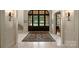 Elegant entryway with arched doorway and rug at 155 Union Chapel Dr, Mooresville, NC 28117