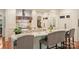 Well-appointed kitchen with a professional range, custom hood, granite counters, and bar seating at 155 Union Chapel Dr, Mooresville, NC 28117