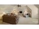 Cozy living room with carpet, a ceiling fan, a TV, and a comfortable couch at 155 Union Chapel Dr, Mooresville, NC 28117