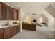 Cozy living room with wet bar featuring custom cabinets and fixtures at 155 Union Chapel Dr, Mooresville, NC 28117
