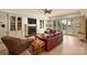 Inviting living room featuring a cozy fireplace, built-in shelving, and access to a large outdoor patio at 155 Union Chapel Dr, Mooresville, NC 28117