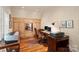 Spacious office with hardwood floors, built-in storage, a desk, and lots of natural light at 155 Union Chapel Dr, Mooresville, NC 28117