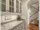 Bright pantry offers custom cabinetry and views to the staircase at 155 Union Chapel Dr, Mooresville, NC 28117