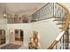 Elegant curved staircase with wrought-iron railing at 155 Union Chapel Dr, Mooresville, NC 28117