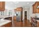 Beautiful kitchen featuring stainless steel appliances, custom wood cabinets and granite countertops at 1813 Wedowee Ct, Rock Hill, SC 29732