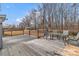 Wooden deck with table and chairs, overlooking yard at 3015 Pageland Hwy, Lancaster, SC 29720