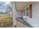 Small front porch with view of wooded area at 3015 Pageland Hwy, Lancaster, SC 29720