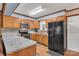 Modern kitchen with stainless steel appliances and light wood cabinets at 3015 Pageland Hwy, Lancaster, SC 29720