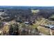See this parcel from above, revealing neighborhood proximity, driveway, and mature trees at 3021 Tryon Courthouse Rd, Bessemer City, NC 28016