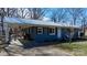 View of the home's front and carport, showing the practical layout of the house at 3021 Tryon Courthouse Rd, Bessemer City, NC 28016