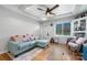 Cozy living room with hardwood floors, a large window, and a comfortable sectional sofa at 3021 Tryon Courthouse Rd, Bessemer City, NC 28016