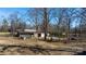 Rustic outbuilding on a spacious lot, perfect for workshop or storage needs at 3021 Tryon Courthouse Rd, Bessemer City, NC 28016