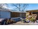 Well-maintained sheds and organized firewood, providing ample storage and resources at 3021 Tryon Courthouse Rd, Bessemer City, NC 28016