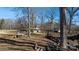 A wooded lot with an outbuilding provides a private retreat, offering space and seclusion at 3021 Tryon Courthouse Rd, Bessemer City, NC 28016