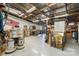 Storage building interior featuring fluorescent lighting and a high ceiling at 3021 Tryon Courthouse Rd, Bessemer City, NC 28016