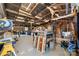Large workshop with shelving, work bench and bright lighting at 3021 Tryon Courthouse Rd, Bessemer City, NC 28016