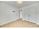 Bright bedroom features wood-look flooring, large closets, and fresh neutral paint at 4648 Madeline Dr, Rock Hill, SC 29732